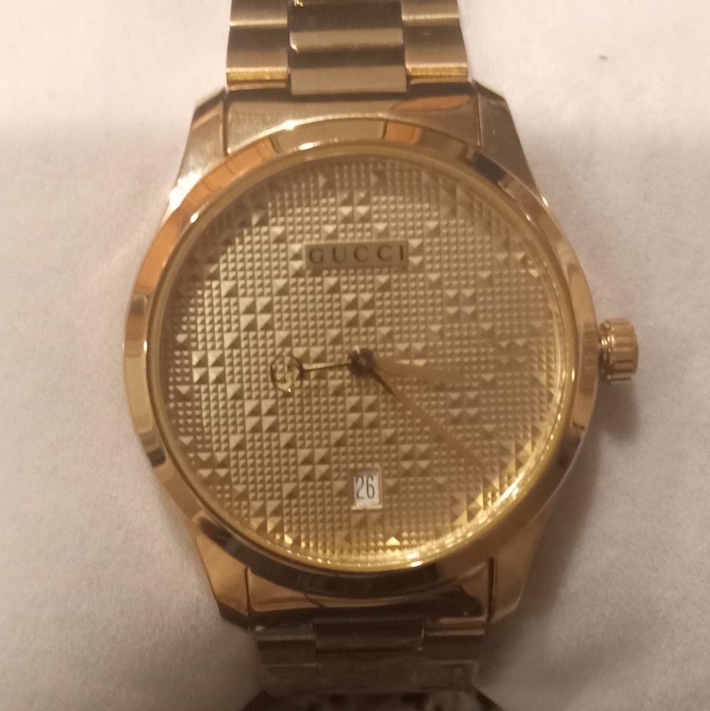 Gucci unisex gold watch